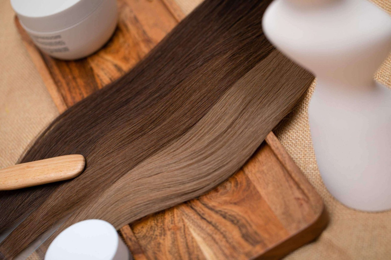 Beauty Club London hair extensions laid out across table
