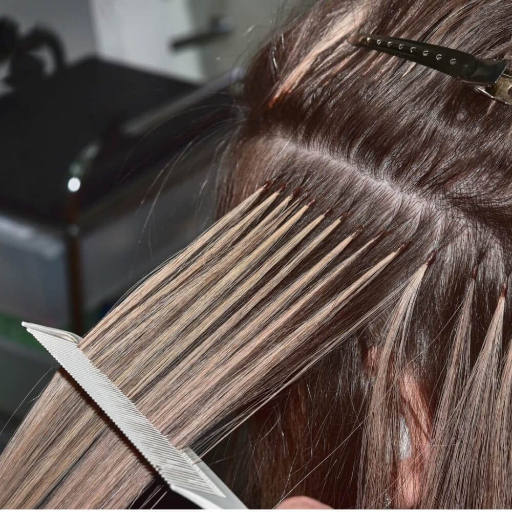 Bonded hair extensions attachment point up close